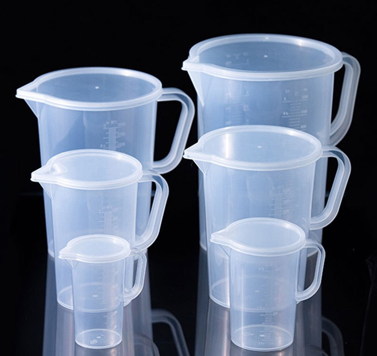 Plastic Measuring Cup-New Handle with Cap
